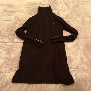 Black turtleneck sweater dress with buttons on sleeves